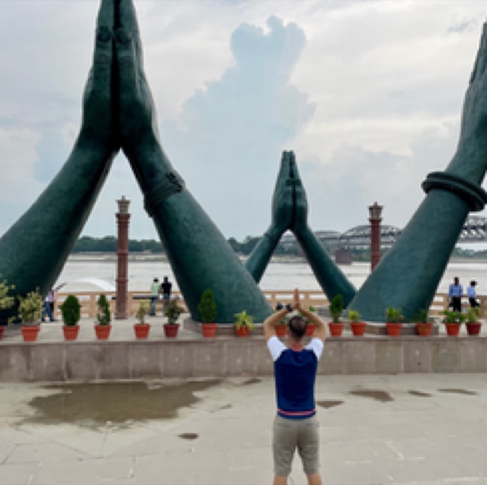 Prayer hands at the River Ganges, India