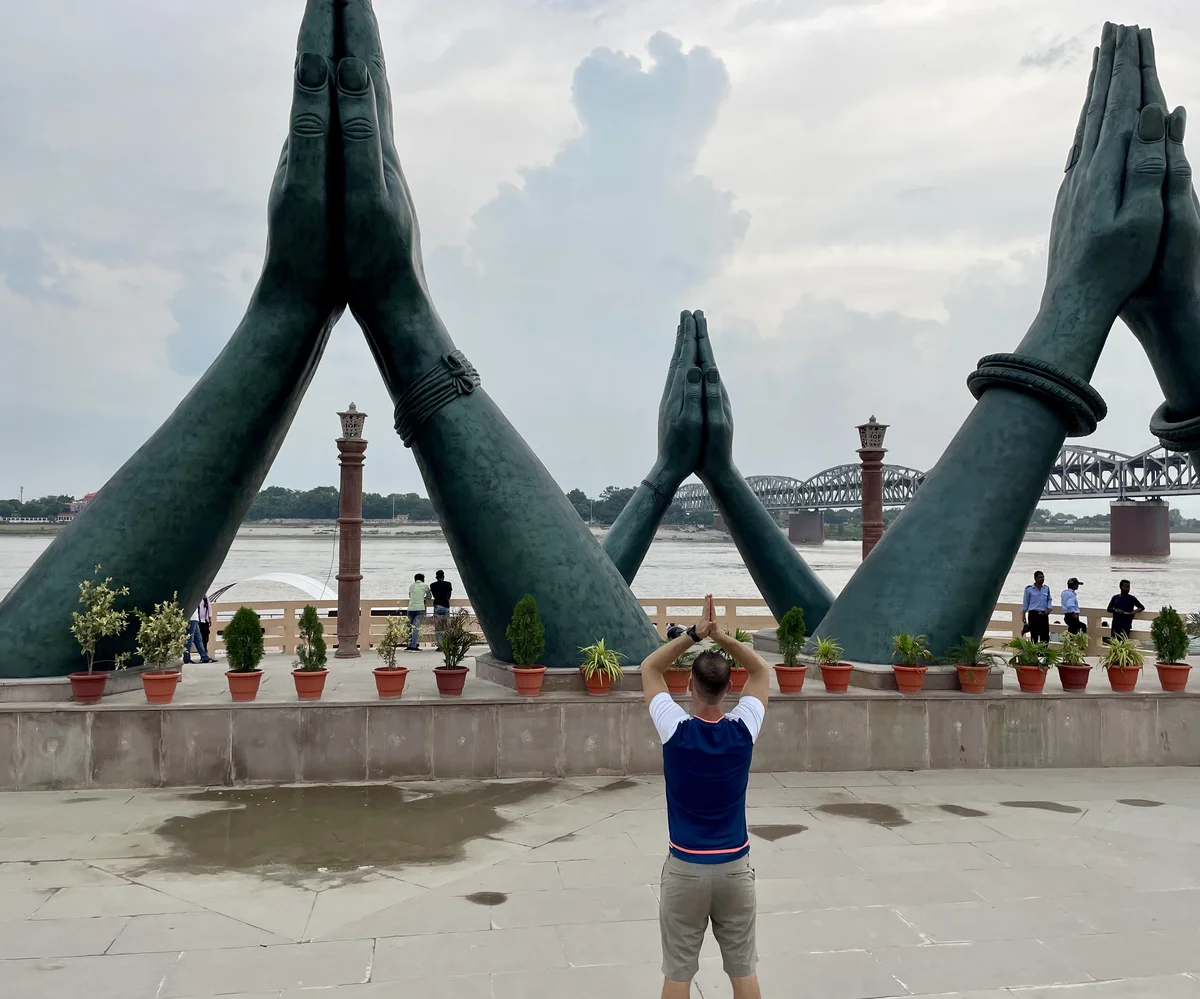 Prayer hands at the River Ganges, India
