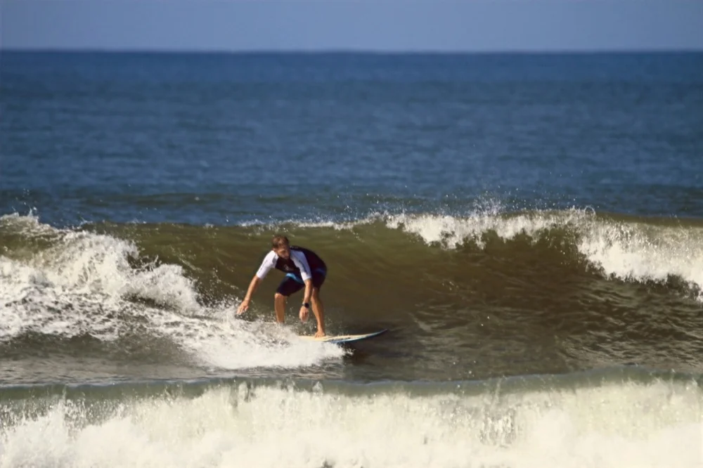 Rob and I surfing Medewi, Bali