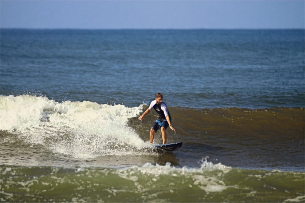 Rob and I surfing Medewi, Bali