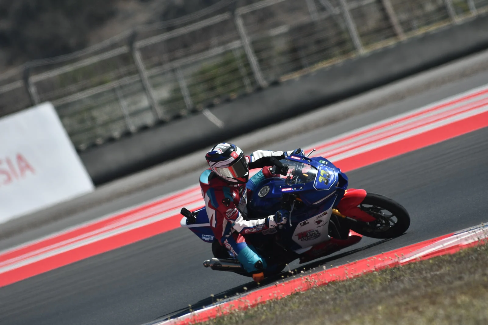 Me cornering on different bikes (always number 33) at Mandalika circuit